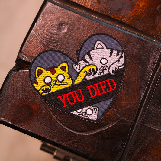 YOU DIED -kangasmerkki