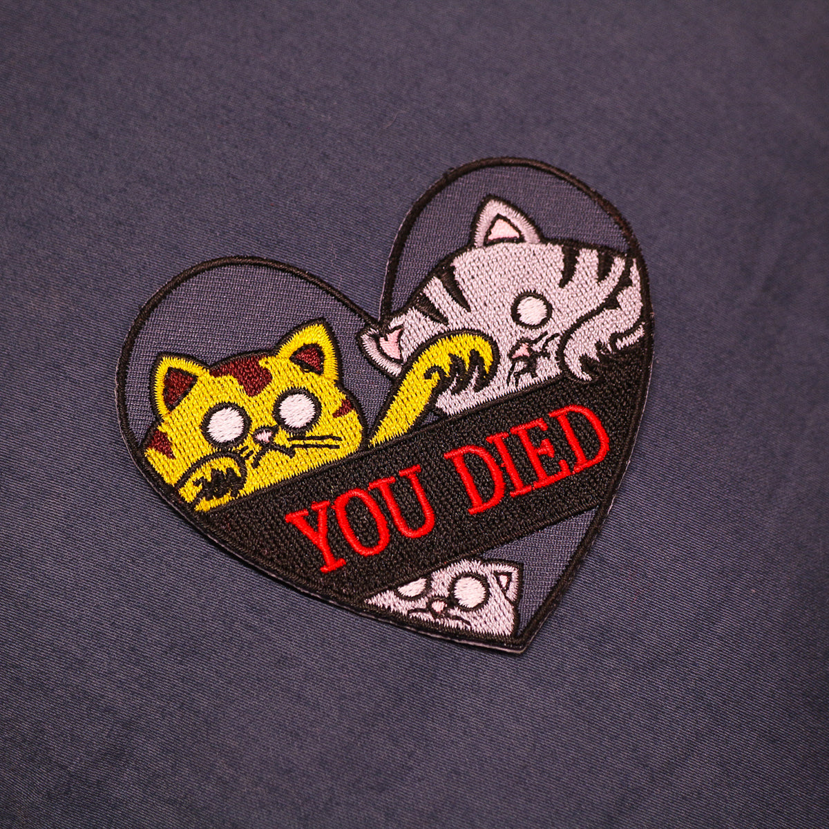 YOU DIED -kangasmerkki